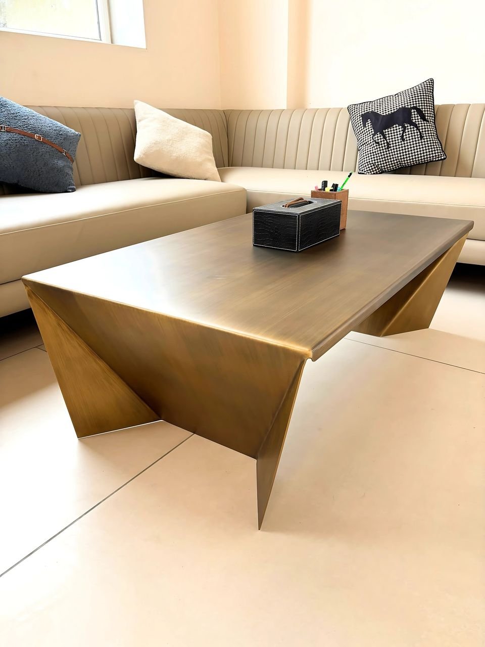 Centre table with a folded metal base