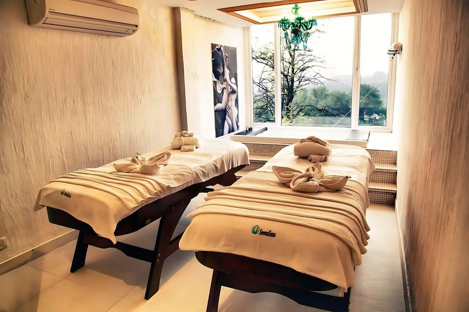 Spa treatment room with twin massage beds