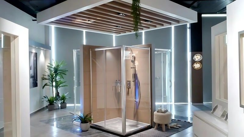 Shower enclosure under a timber-slat canopy with planting