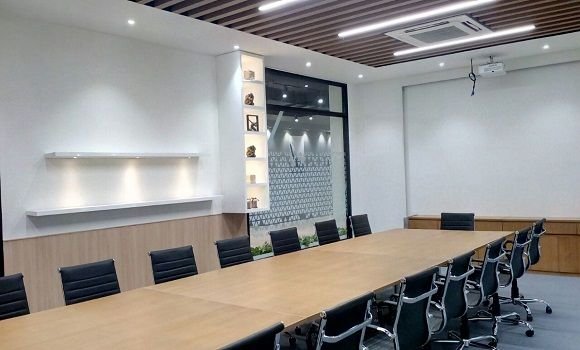 Conference room with timber table and display niches